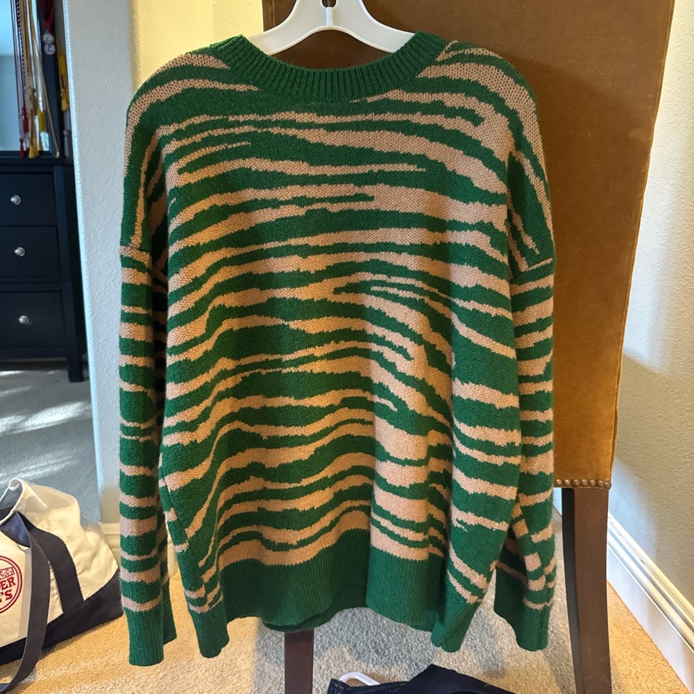 Green and tan sweater